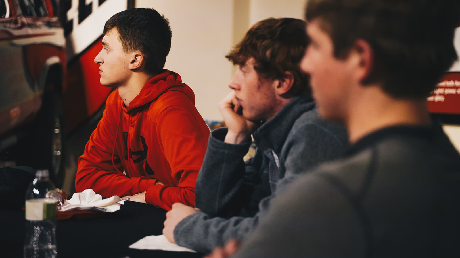 Students in classroom looking at monitor